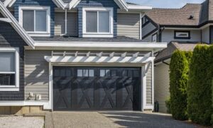 a rustic style garage door installed on home